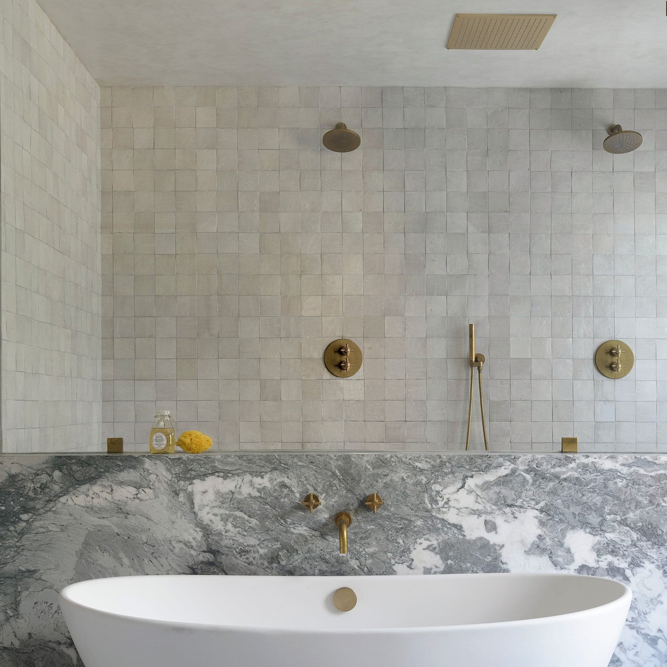 http://www.cletile.com/cdn/shop/articles/cle-tile-zellige-glazed-terracotta-weathered-white-bathroom-shower-wall-design-studio-db-photography-Matthew-Williams-square-2300x2300px-300dpi_marketing-retouch.jpg?v=1690408480