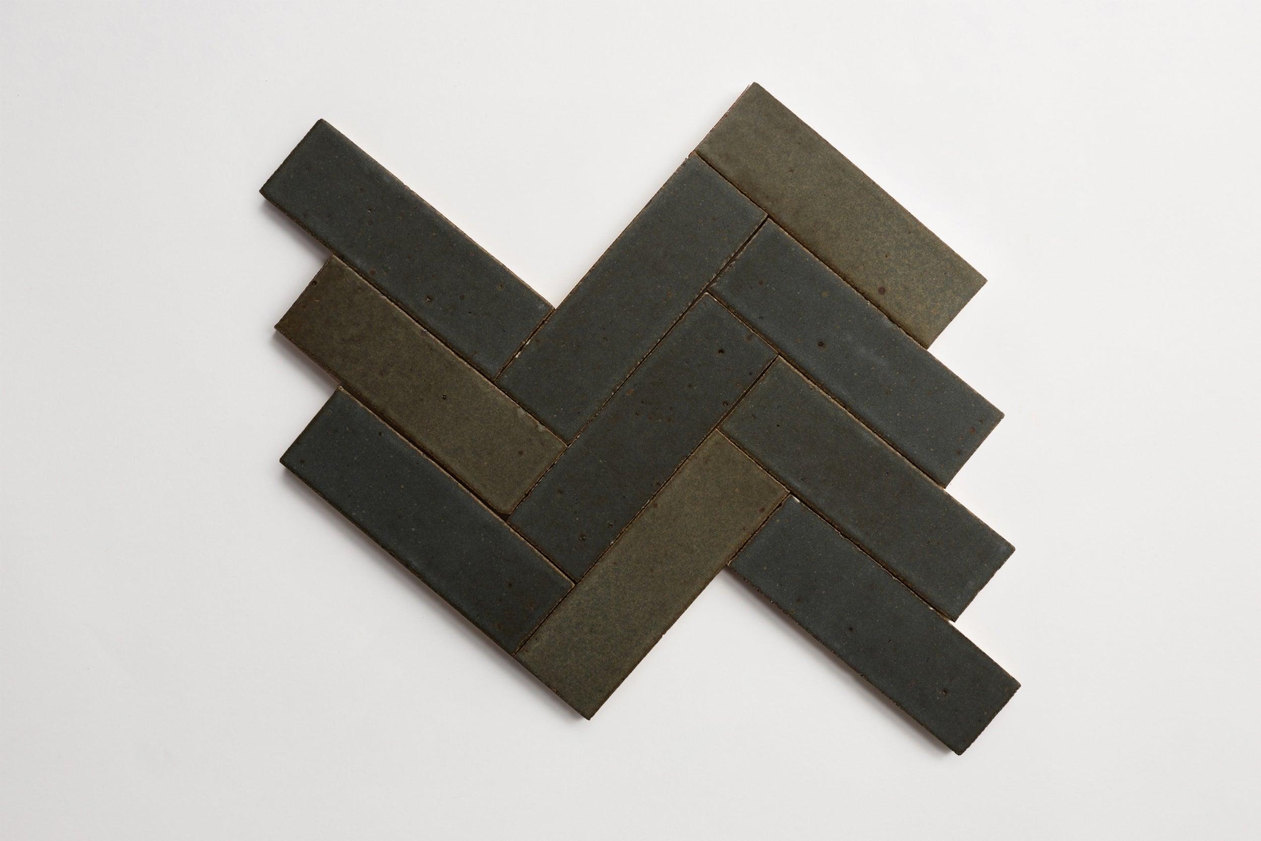 cle-tile-brick-herringbone-secondshelf-guild-ca21788.jpg