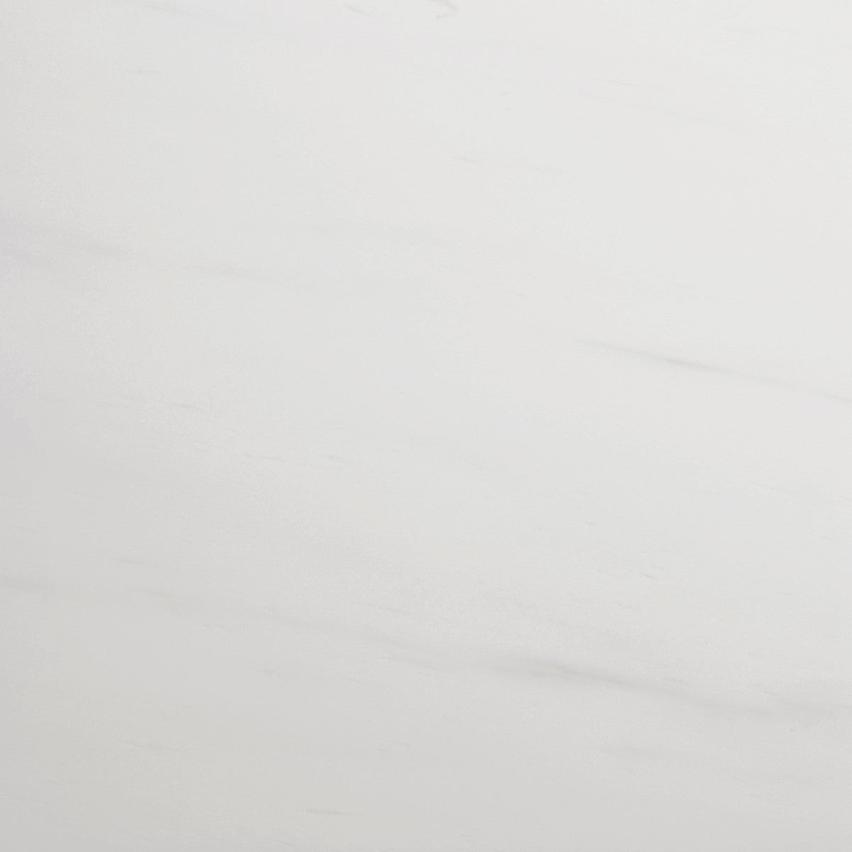 A smooth, light-colored marble surface with subtle gray veining and a matte finish.