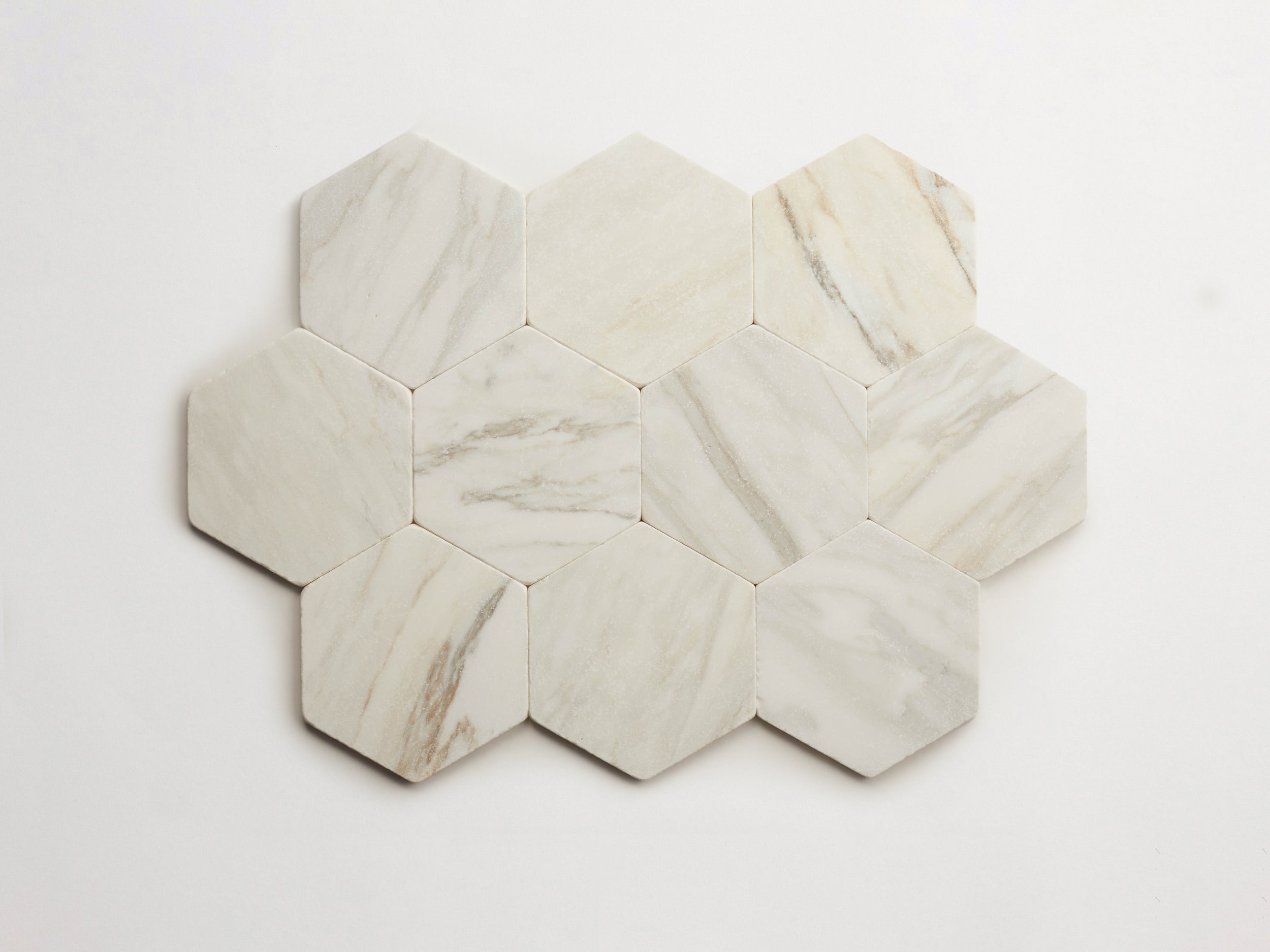 cle-tile-stone-tumbled-lapidary-calacatta-gold-hex-10up-3000x2250-300dpi .jpg