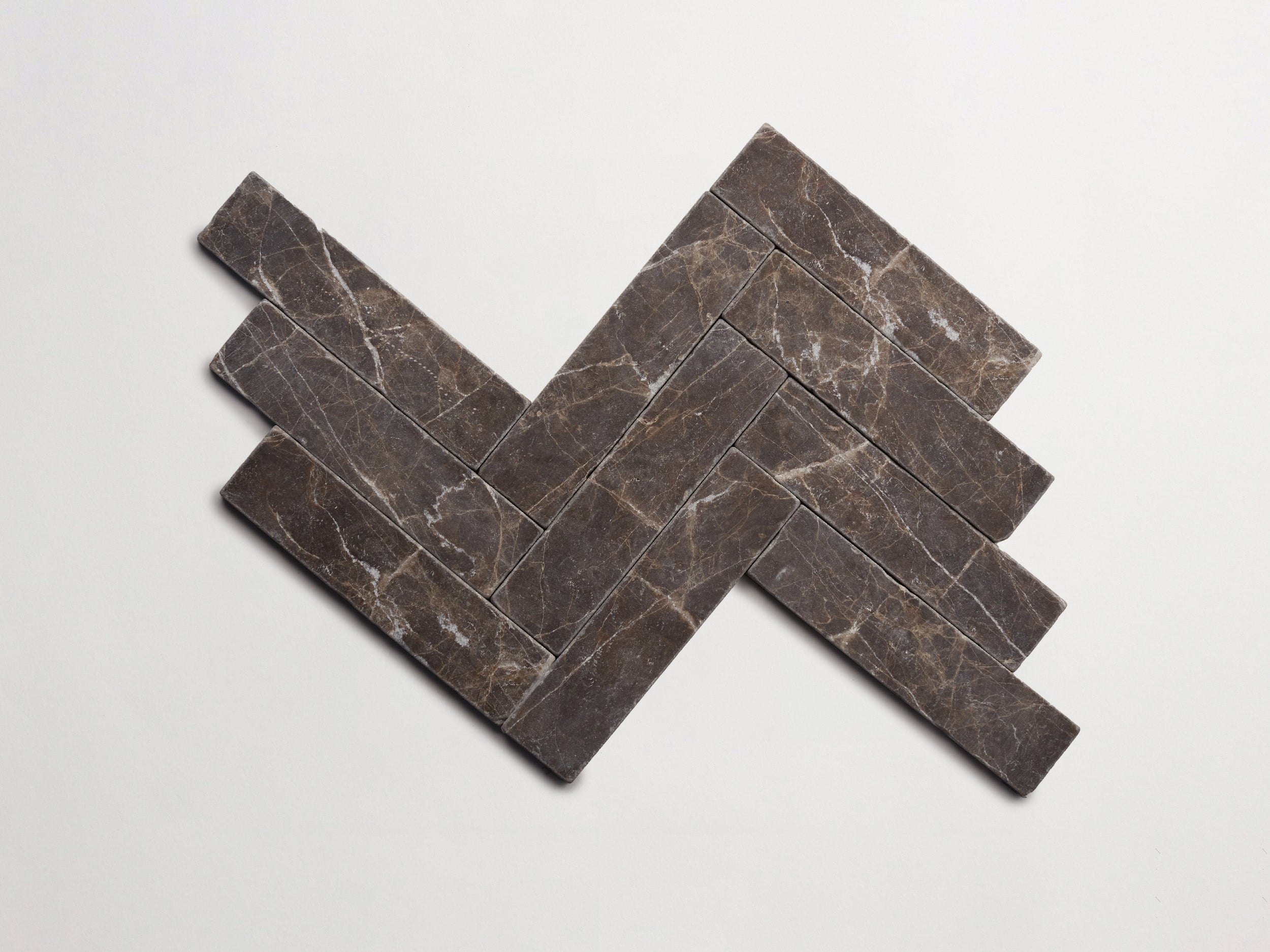cle-tile-stone-tumbled-lapidary-cigar-herringbone-iberian-chocolate-3000x2250-300dpi.jpg