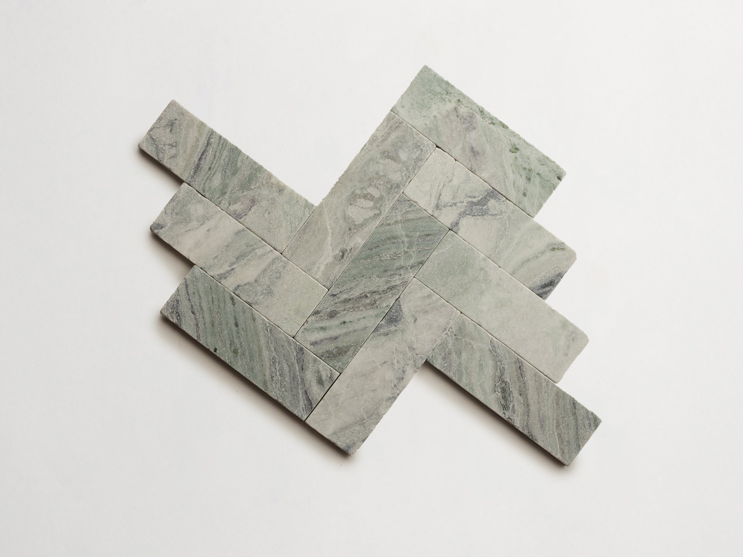 cle-tile-stone-tumbled-lapidary-jade-green-baguette-herringbone-3000x3000-300dpi.jpg