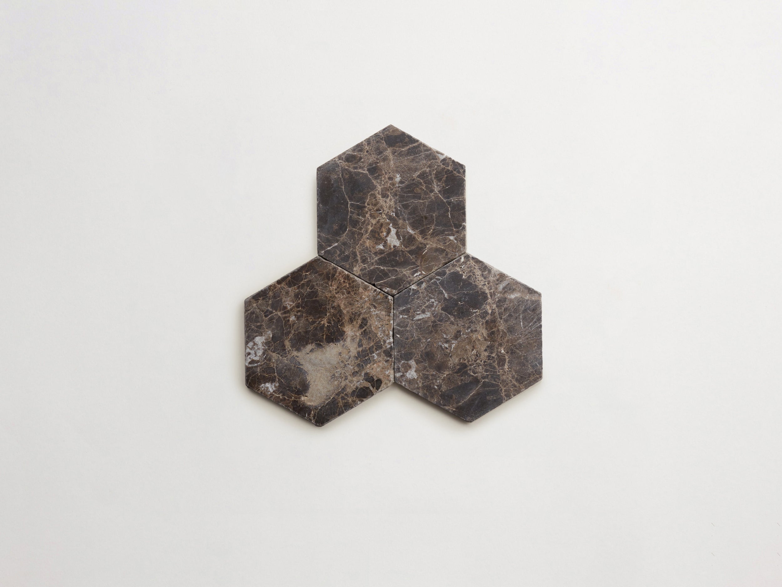 cle-tile-stone-tumbled-lapidary-hex-3up-iberian-chocolate-3000x2250-300dpi.jpg