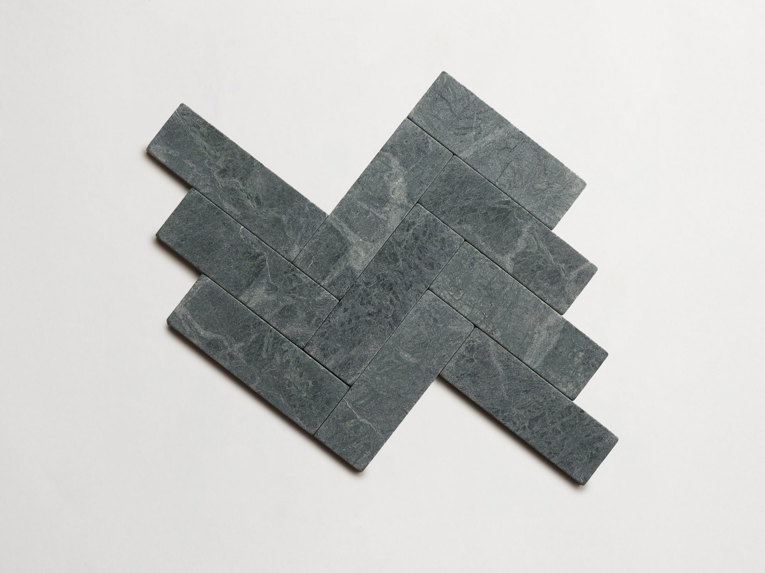 cle-tile-stone-tumbled-lapidary-verde-marble-baguette-herringbone-3000x3000-300dpi.jpg