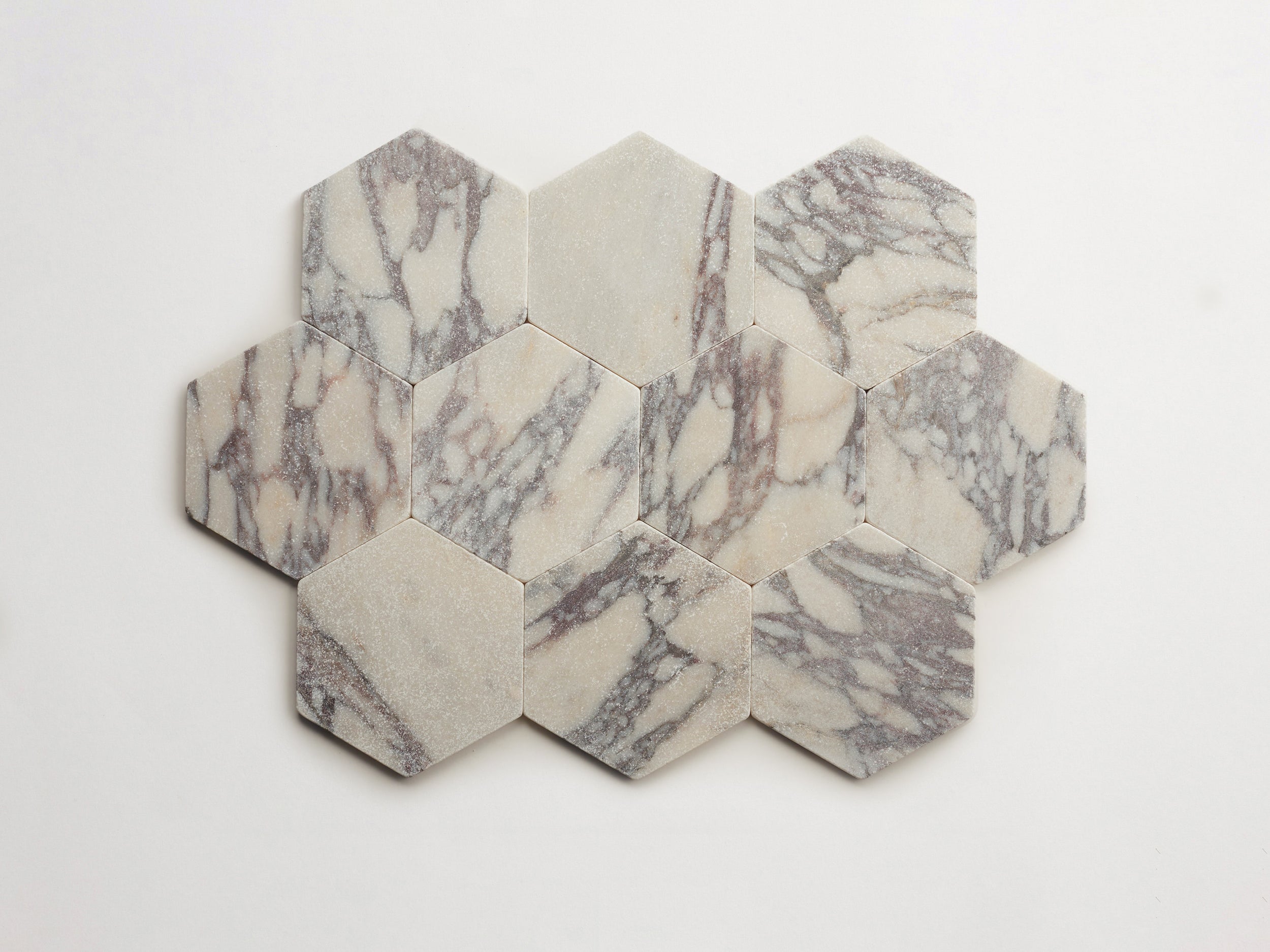 cle-tile-stone-tumbled-lapidary-calacatta-viola-hex-10up-3000x2250-300dpi .jpg