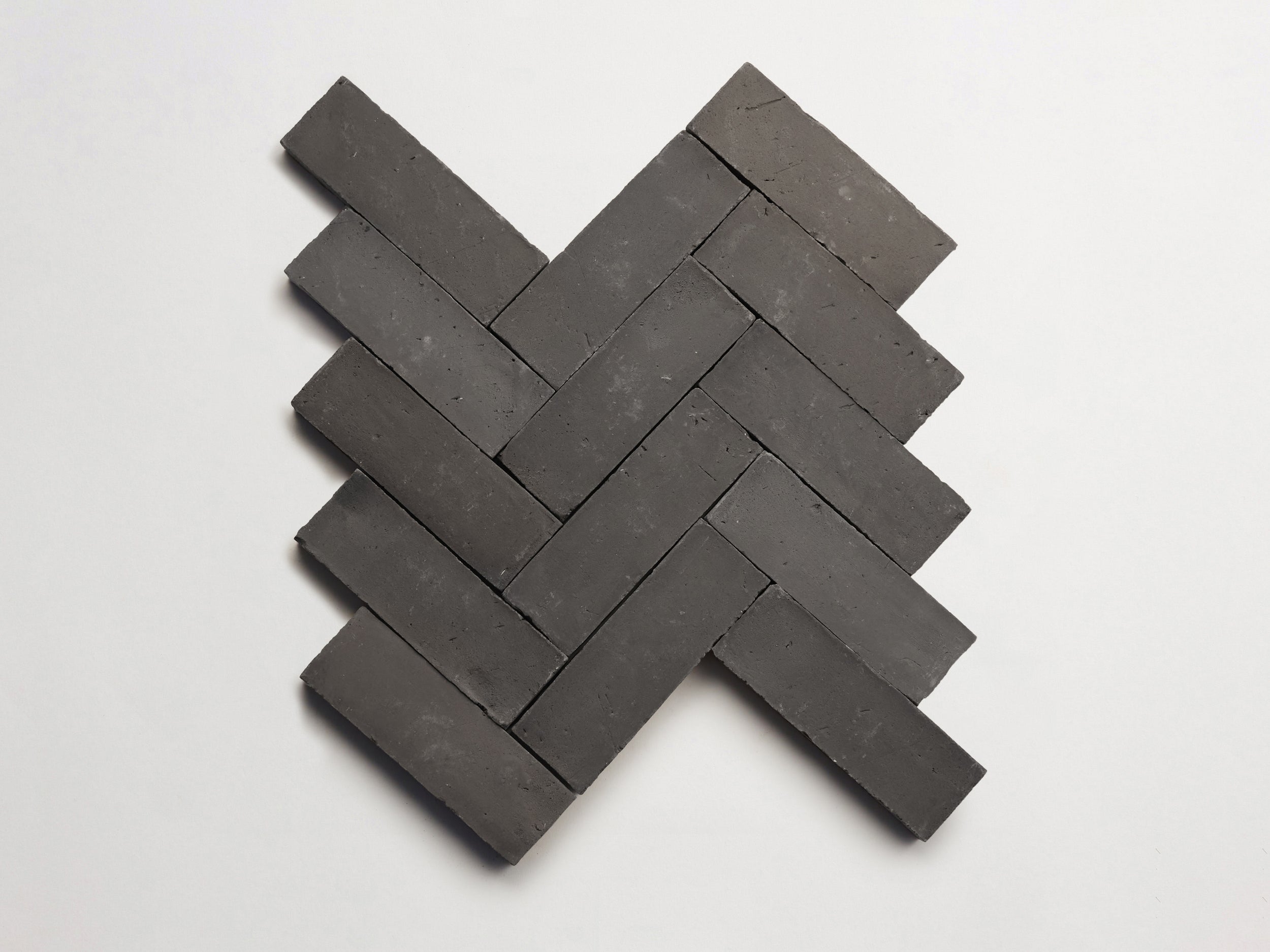 cle-tile-terracotta-belgian-reproduction-2x6-herringbone-black-3000x2250-300dpi copy.jpg