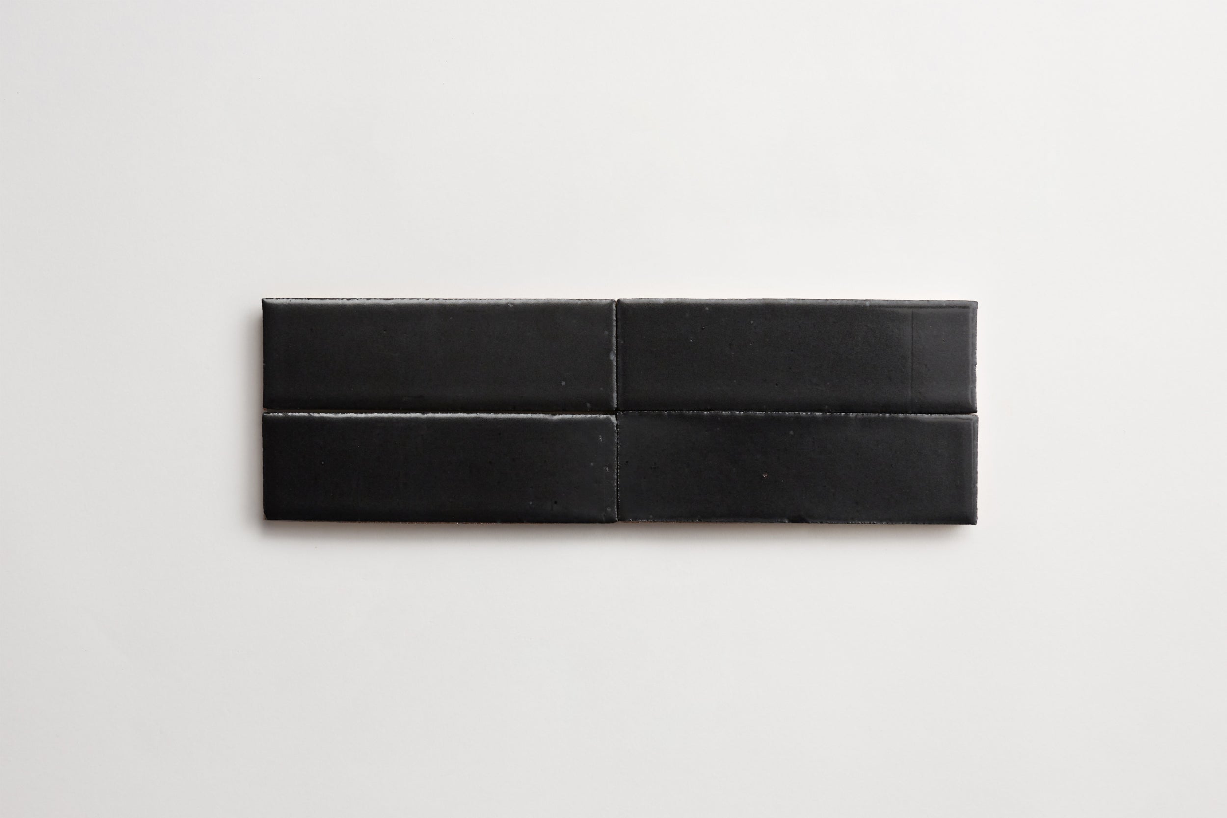 cle-tile-brick-4up-secondshelf-guild-blackvelvet.jpg