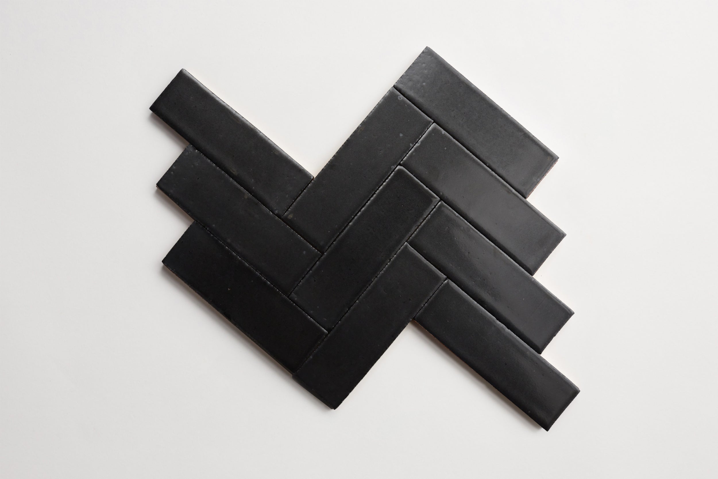 cle-tile-brick-herringbone-secondshelf-guild-blackvelvet.jpg