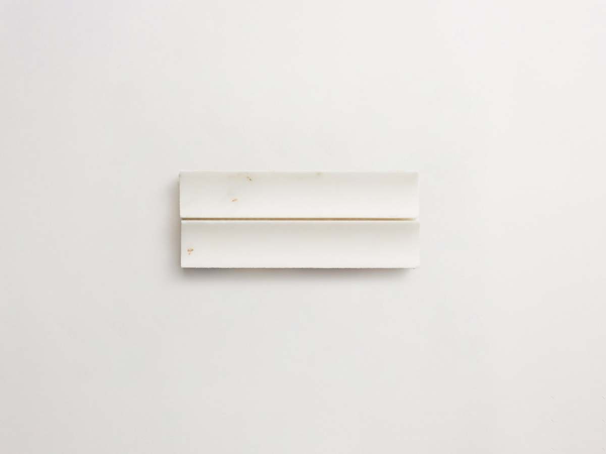 Fluted 3d-tile calacatta gold marble etui petit.