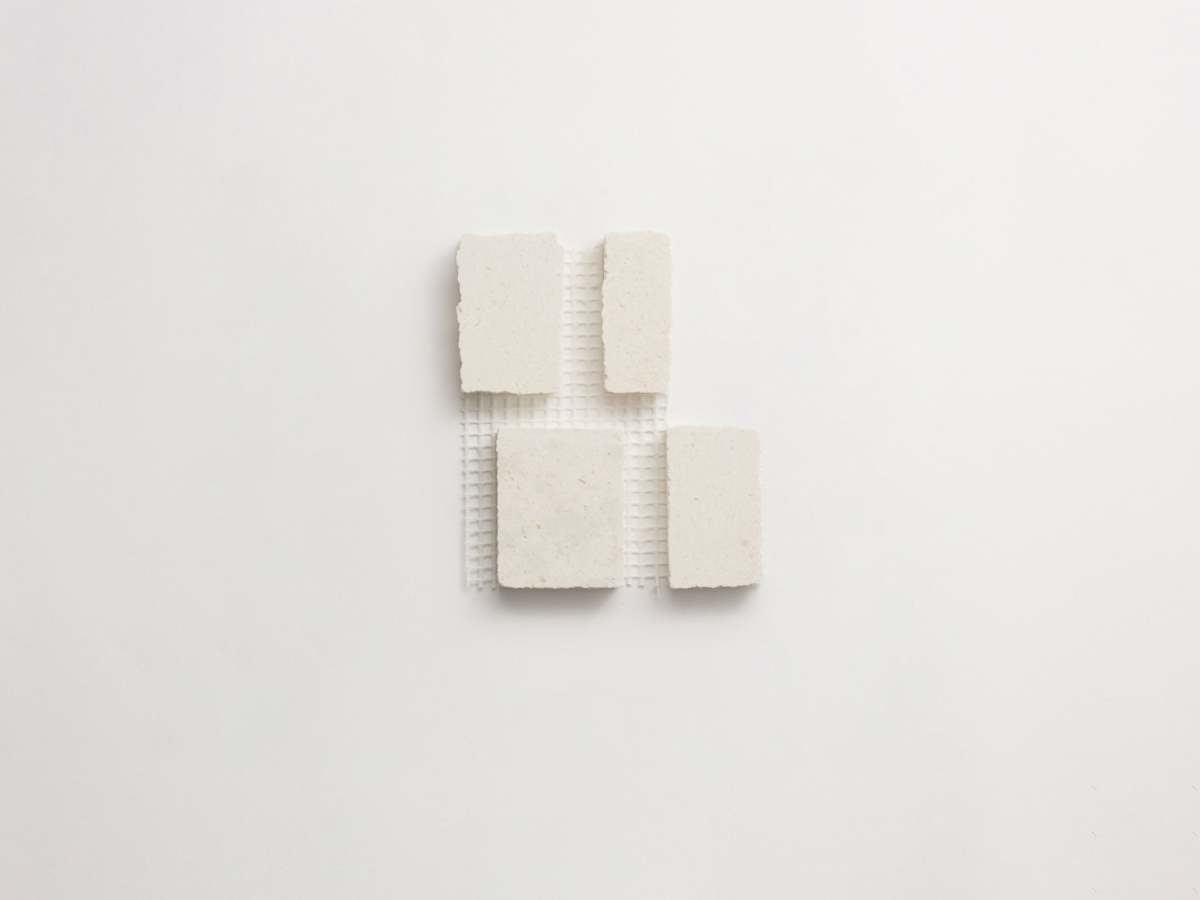 White mosaic tile limestone wide grout lapidary.
