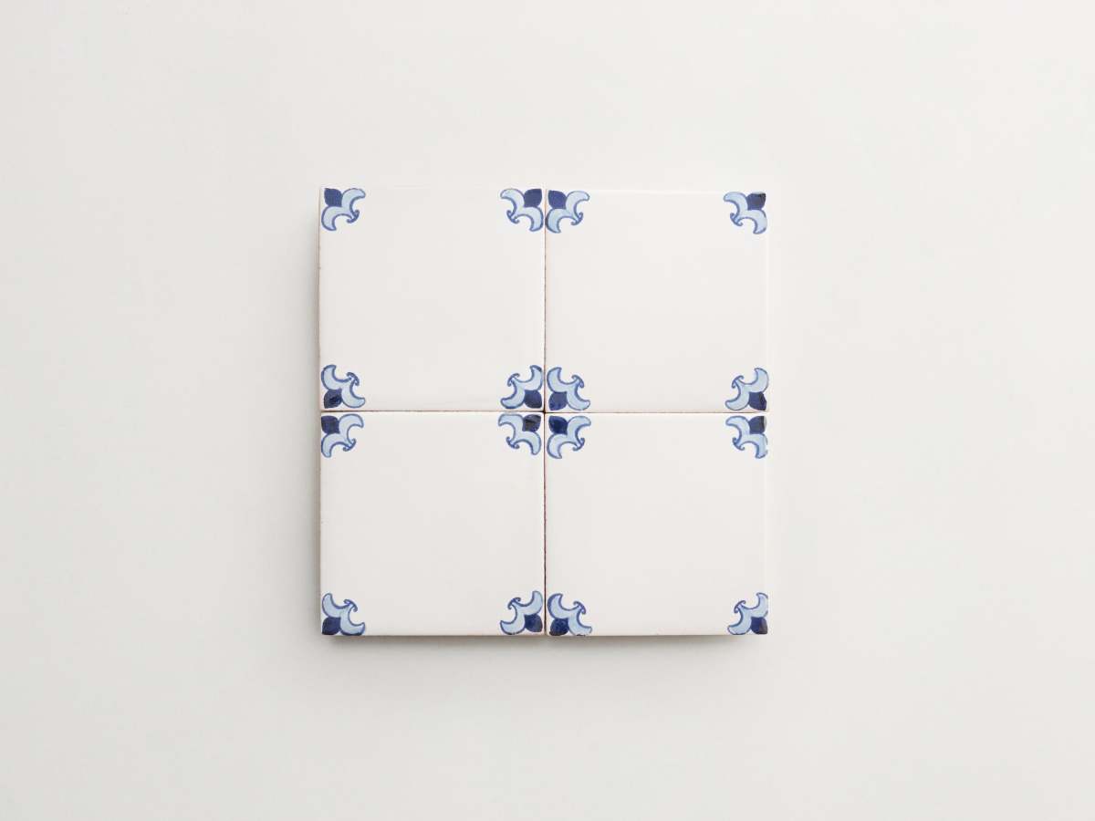 Light dark backsplash blue ceramic painted square delft.