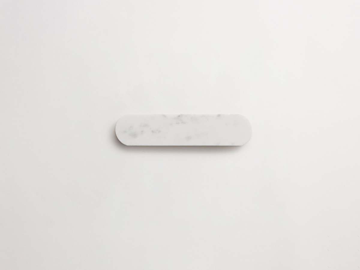 Carrara marble mosaic tile petit oval lapidary.