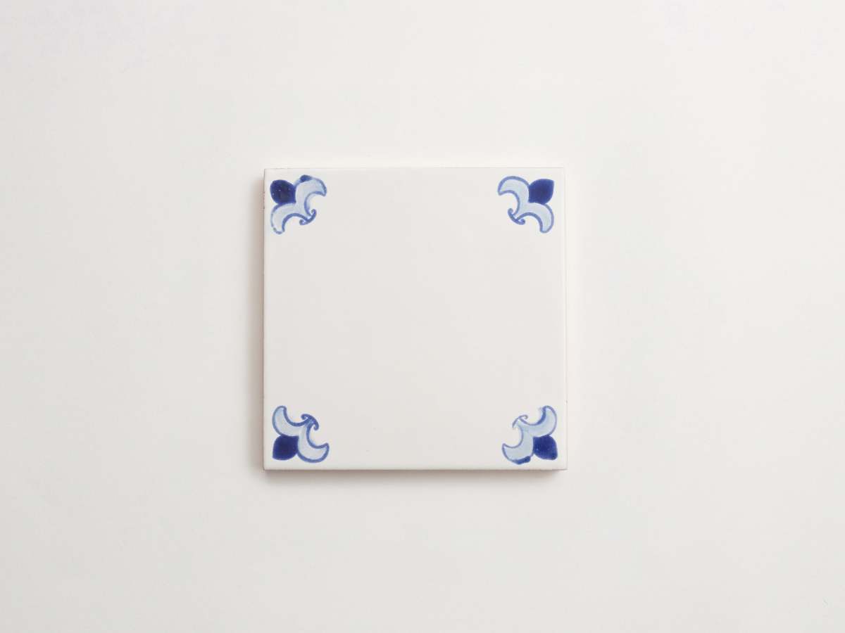 Light dark backsplash blue ceramic painted square delft.