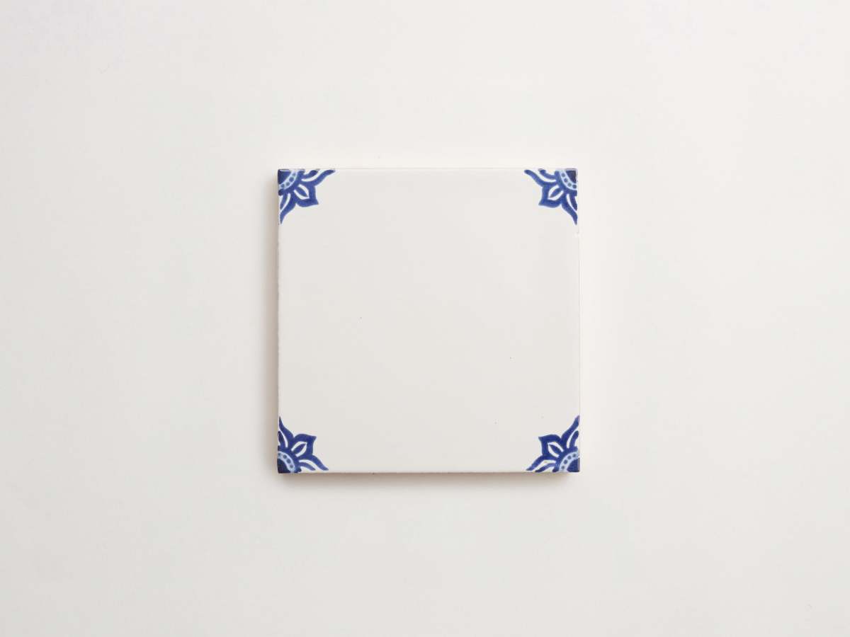Blue painted flower corner porcelain tile majolica delft.
