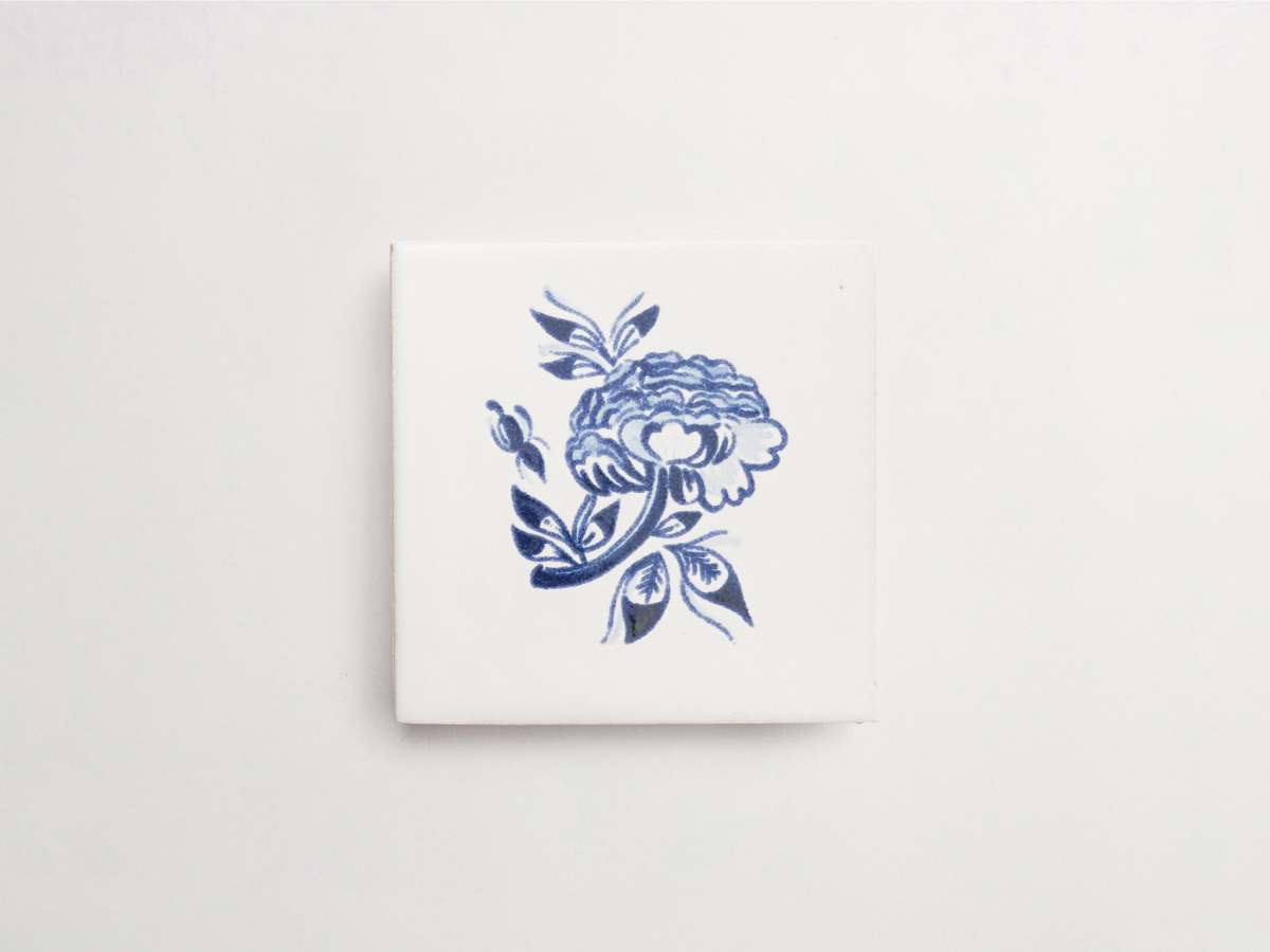 Hand painted blue flower pattern majolica delft square tile.