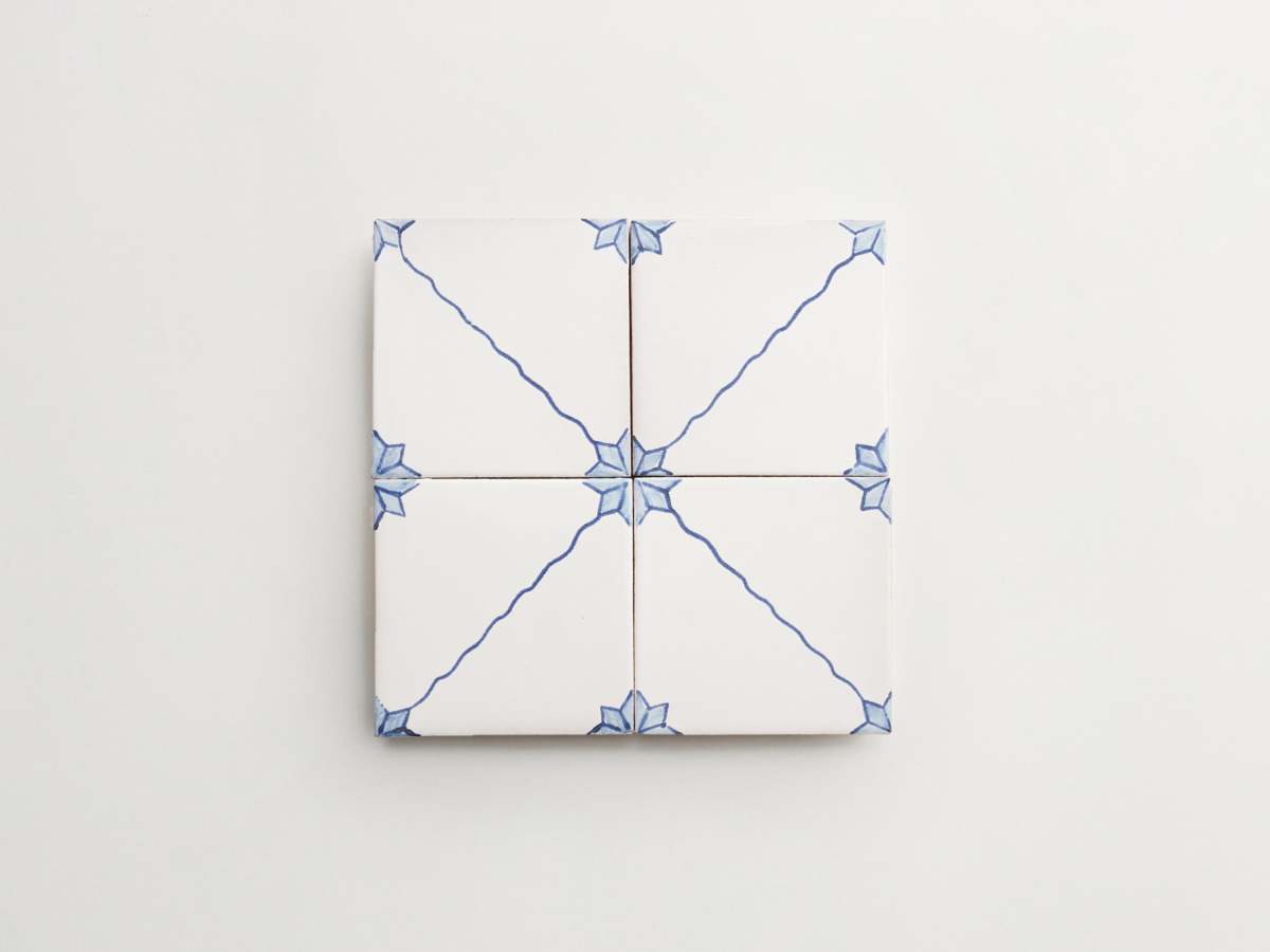 White blue painted square ceramic tile majolica delft.