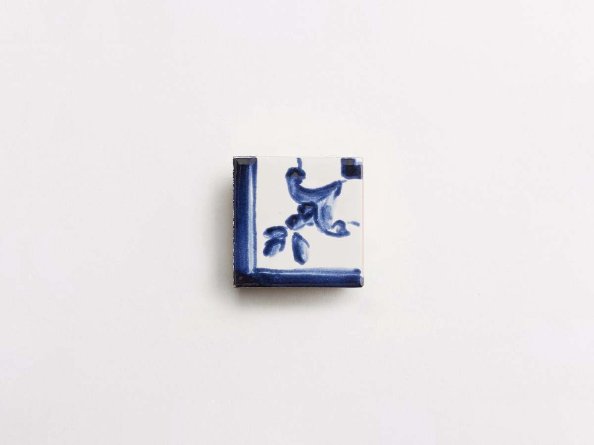 Decorative ceramic painted blue square border tile delft.