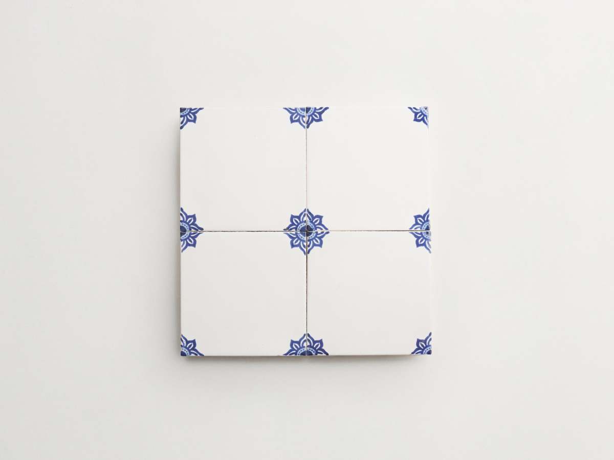 Blue painted flower corner porcelain tile majolica delft.