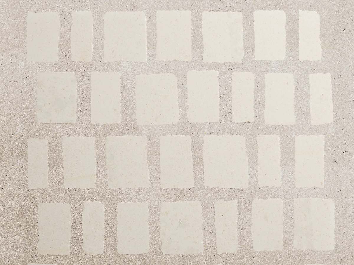 White mosaic tile limestone wide grout lapidary.