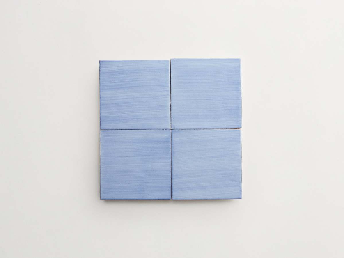 Painted medium blue majolica square ceramic delft.