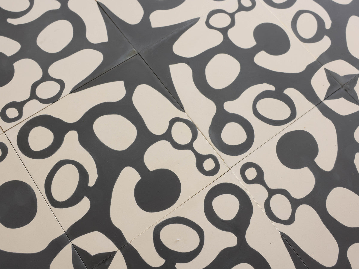Ruan Hoffmann cement tile Paris Fizz pattern White, Grey.