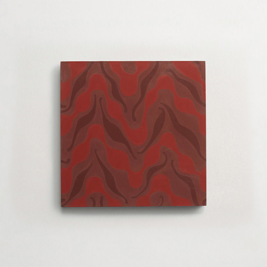 A square canvas with an abstract pattern of wavy, overlapping shapes in various shades of red and brown, displayed on a plain white wall.