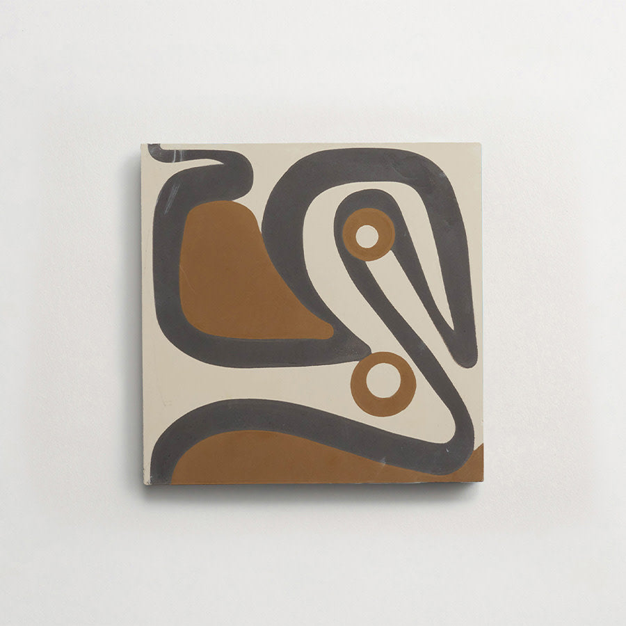 Square ceramic tile featuring an abstract design with curved black lines and brown shapes on a white background.