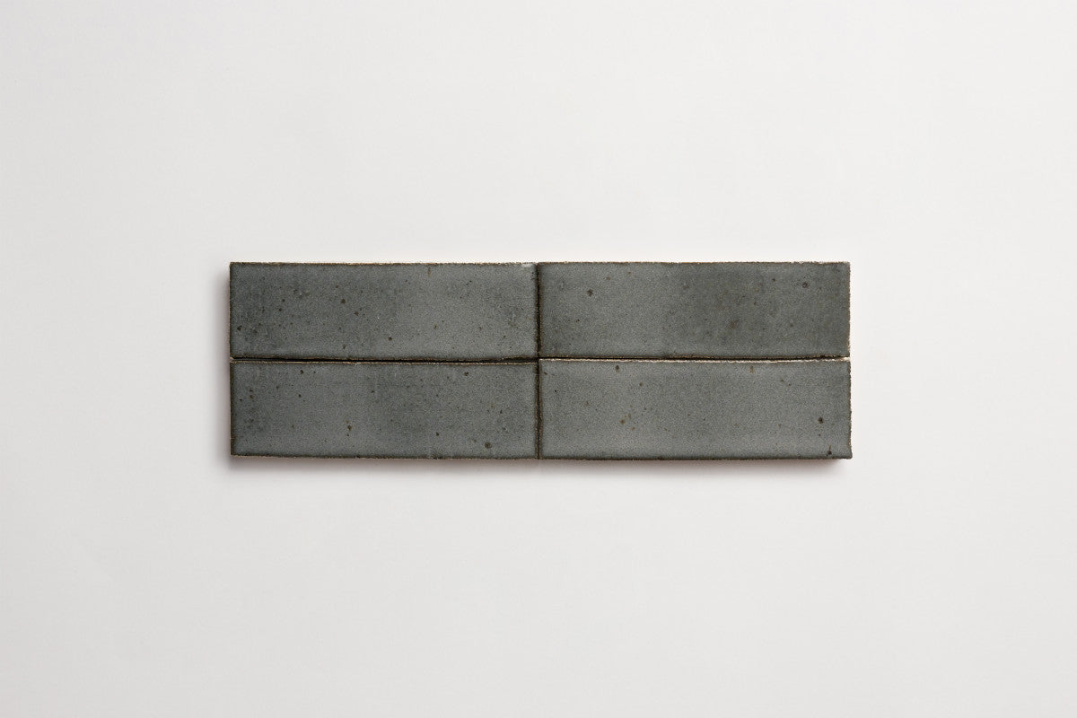 Guild thin glazed brick black wool 8 x 2.5 x 0.5.