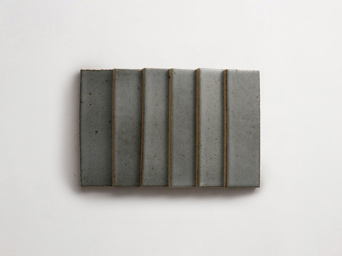 Guild thin glazed brick black wool 8 x 2.5 x 0.5.
