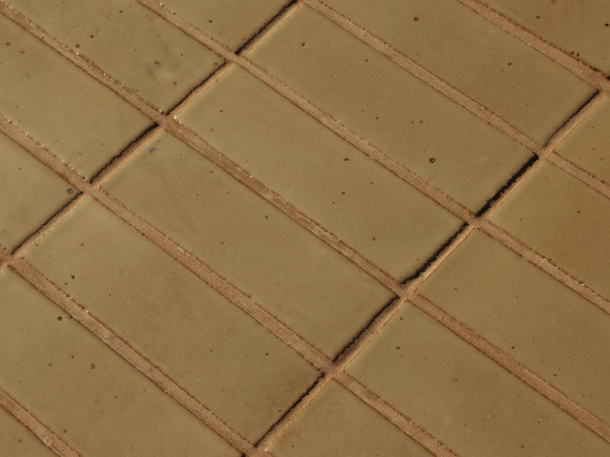 Guild thin glazed brick cambric grege 8 x 2.5 x 0.5.