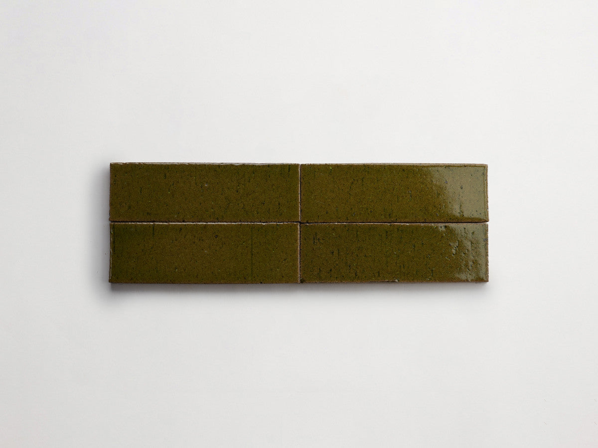 Glazed thin brick 2½x8 Taghkanic Tan Green guild.
