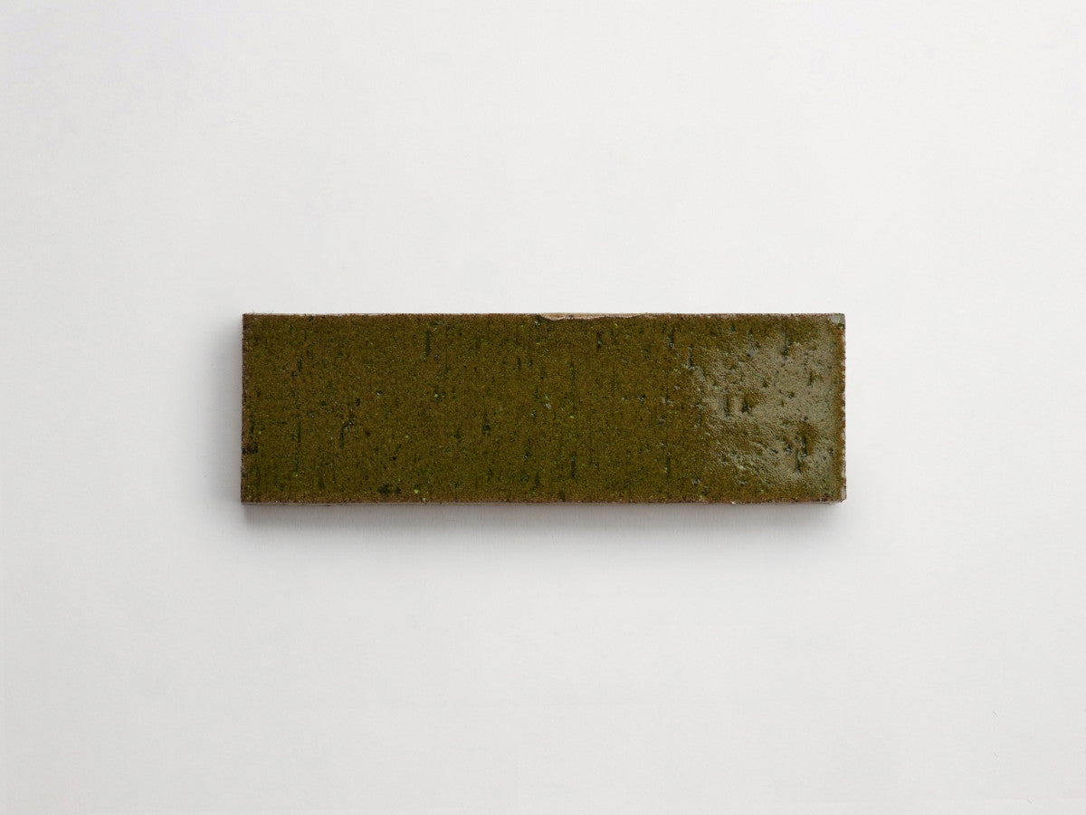 Glazed thin brick 2½x8 Taghkanic Tan Green guild.