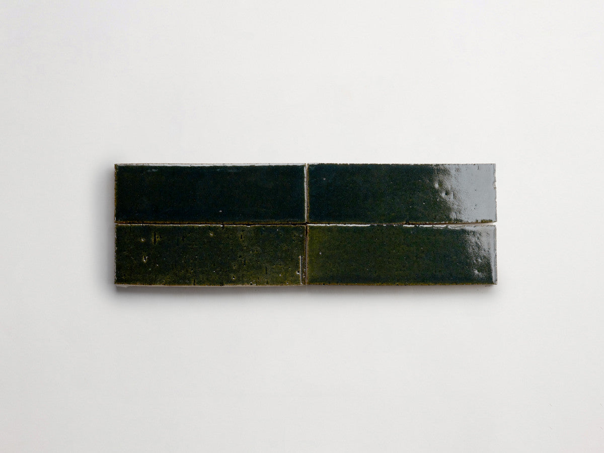 Glazed thin brick 2½x8 Turtle Bay Green guild.