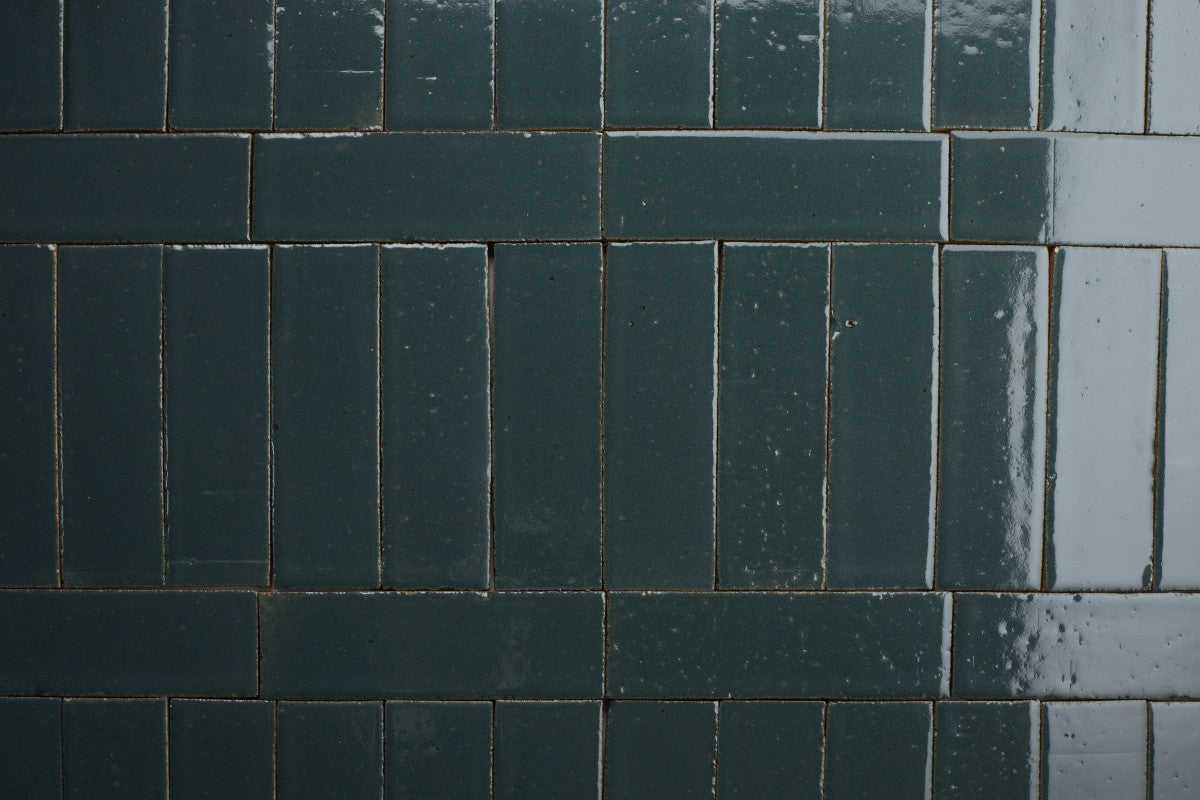 Glazed thin brick 2½x8 Cold Spring Blue guild.