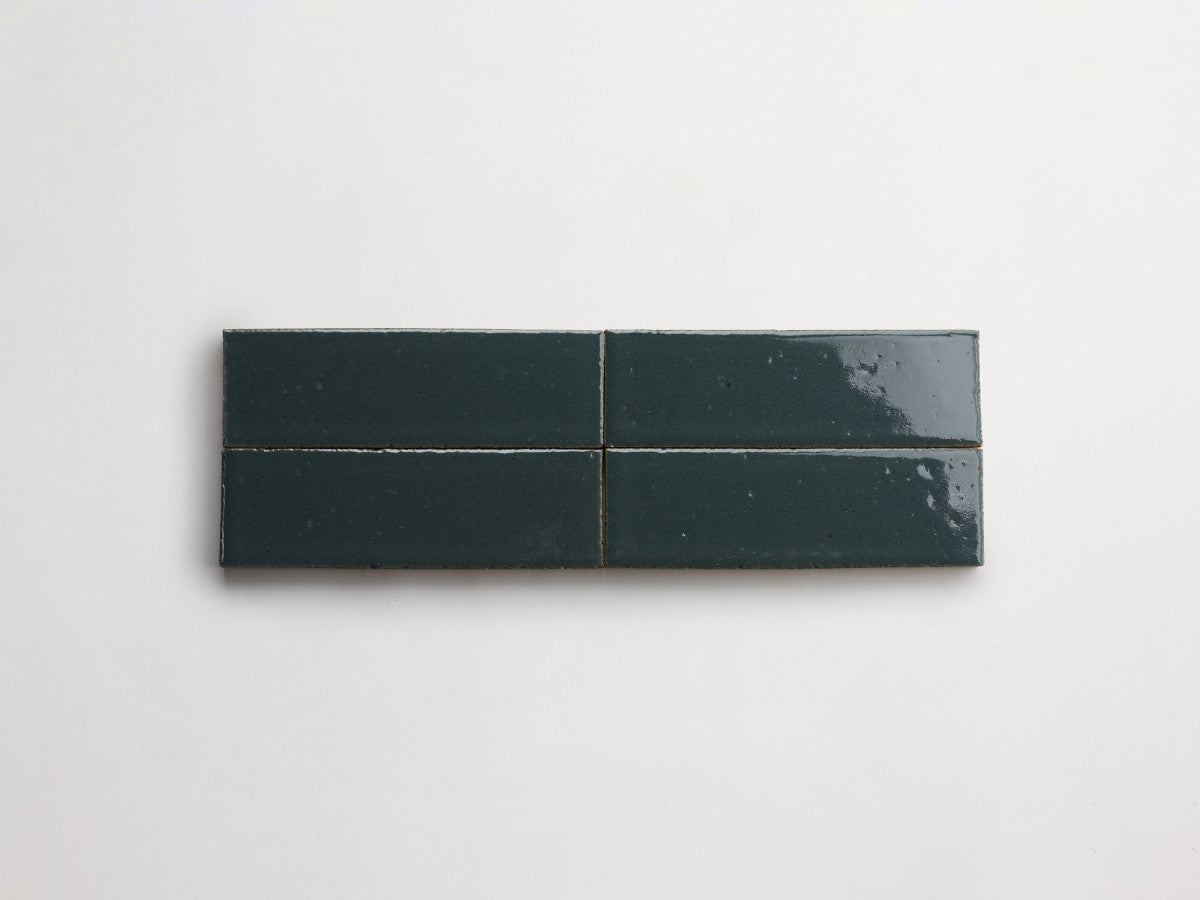 Glazed thin brick 2½x8 Cold Spring Blue guild.