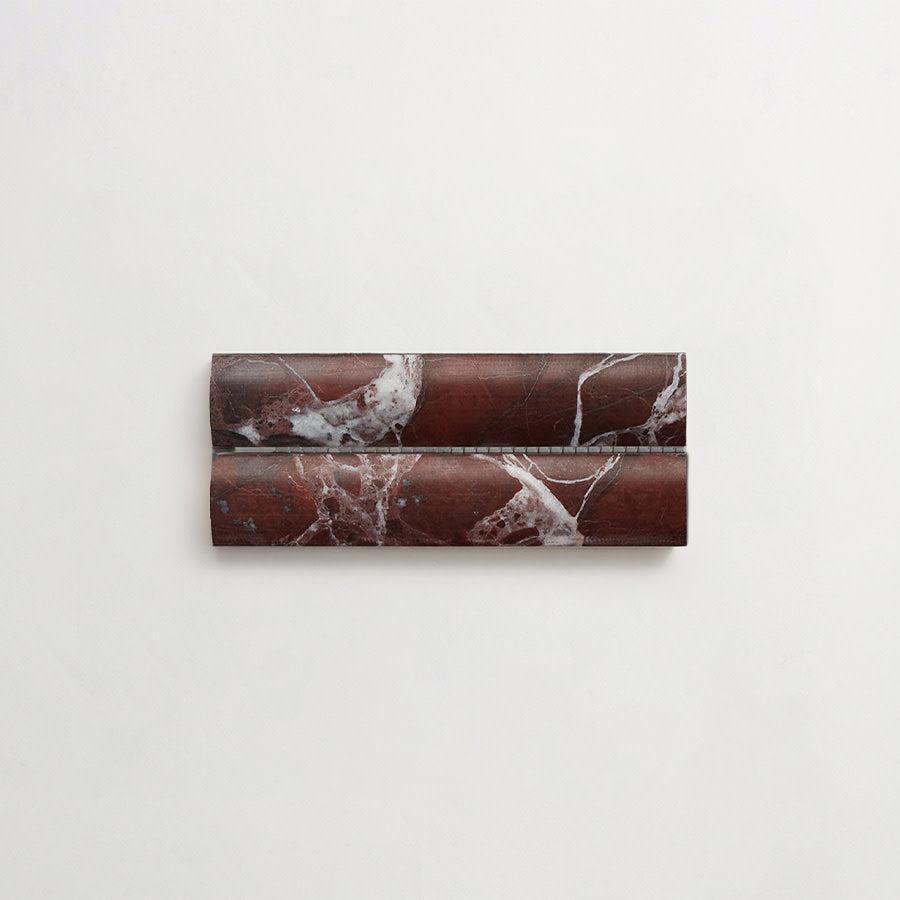Two rectangular pieces of dark red marble with white veining are placed side by side on a plain white background.