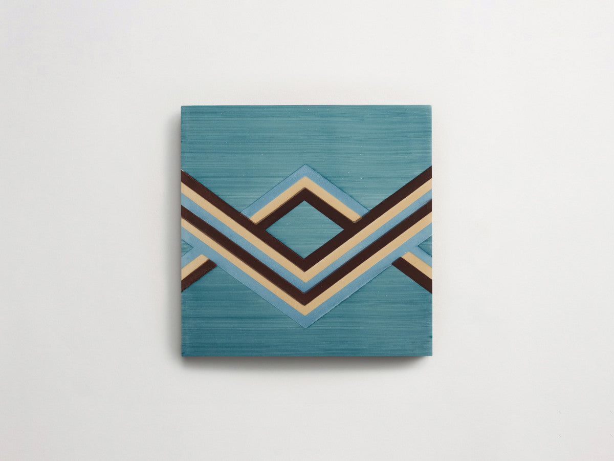 Italian designer ceramic tile Blue Angled Stripes.