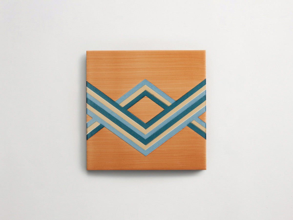 Italian designer ceramic tile Orange Angled Stripes.