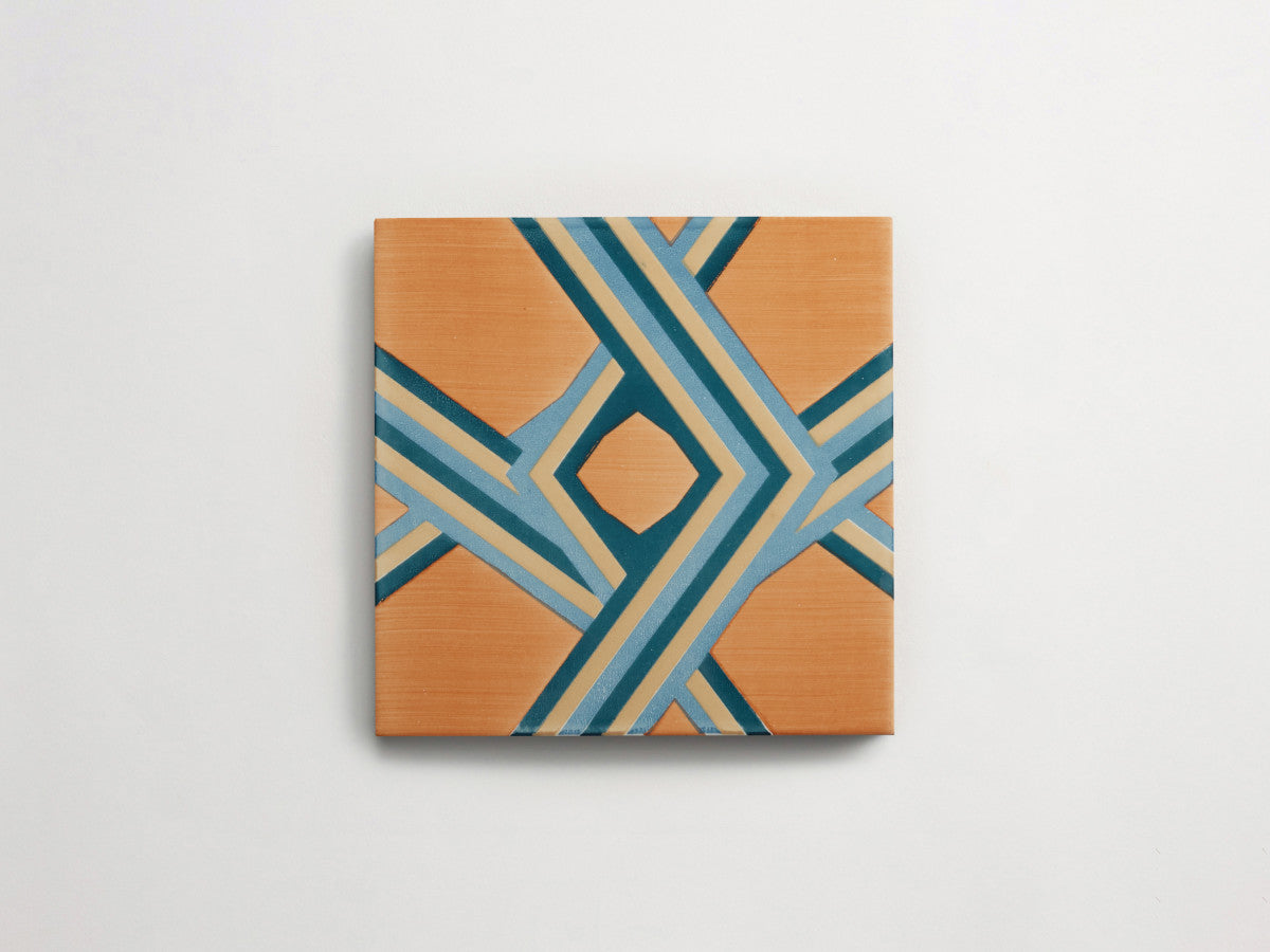 Italian designer ceramic tile Orange Angled Stripes.