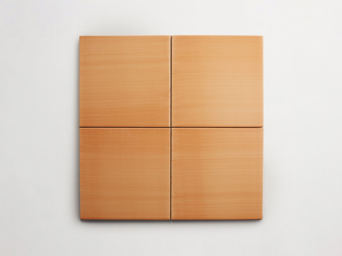 Italian designer ceramic tile Orange Solid.