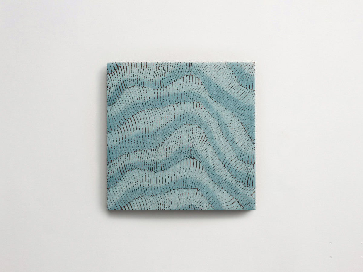 Italian designer ceramic tile Blue Sand Motif.
