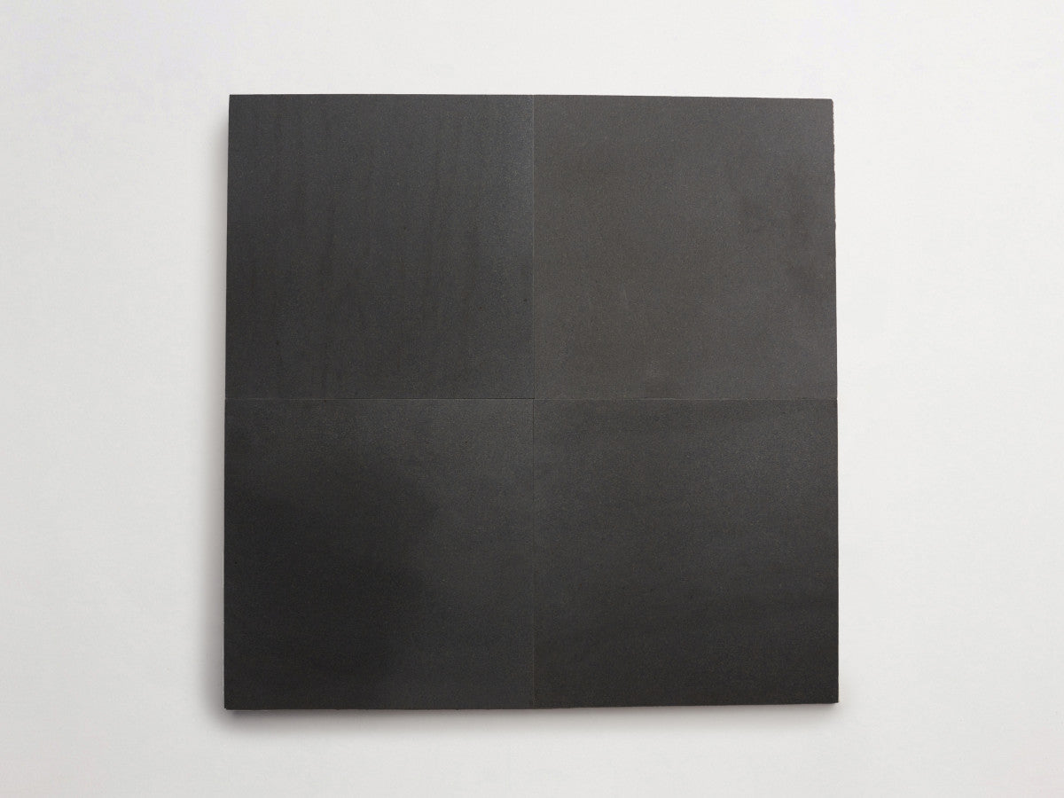 Lapidary stone tile 12 in. square Warm Black Honed.