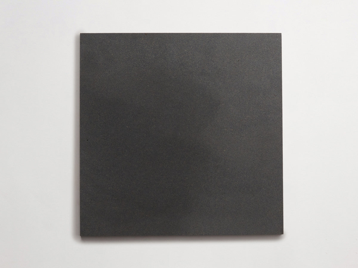 Lapidary stone tile 12 in. square Warm Black Honed.