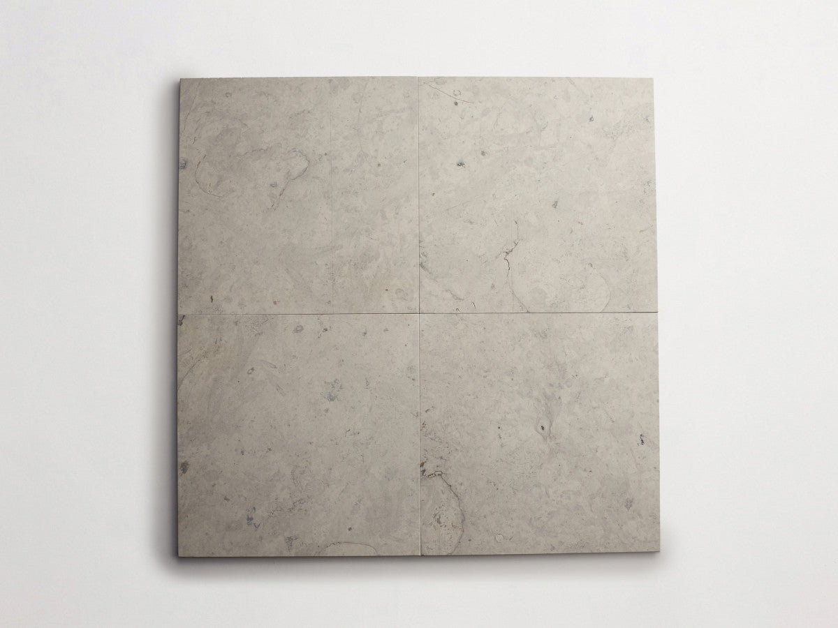 Lapidary stone tile 12 in. square Alpaca Grey Honed.