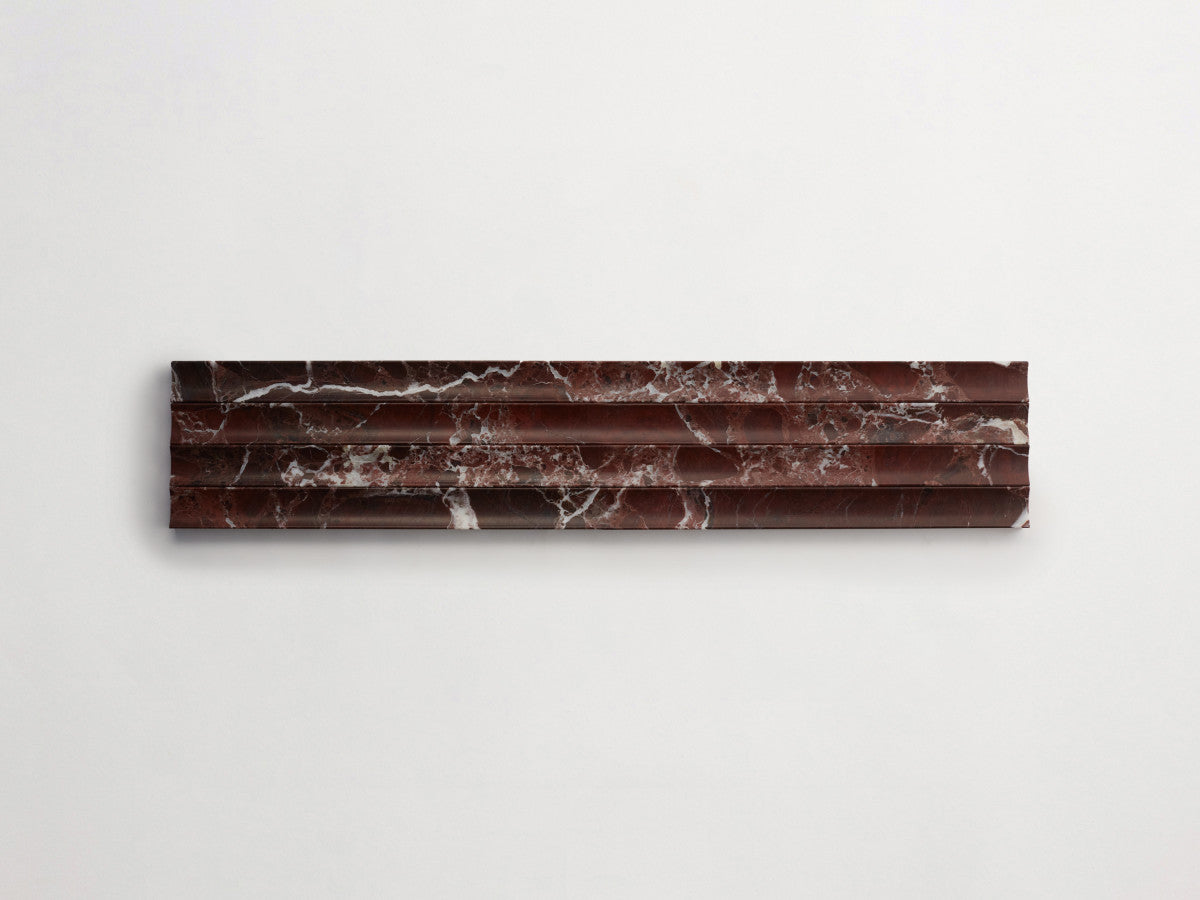 Lapidary stone tile 23½ x 1¼ fluted Red Honed.