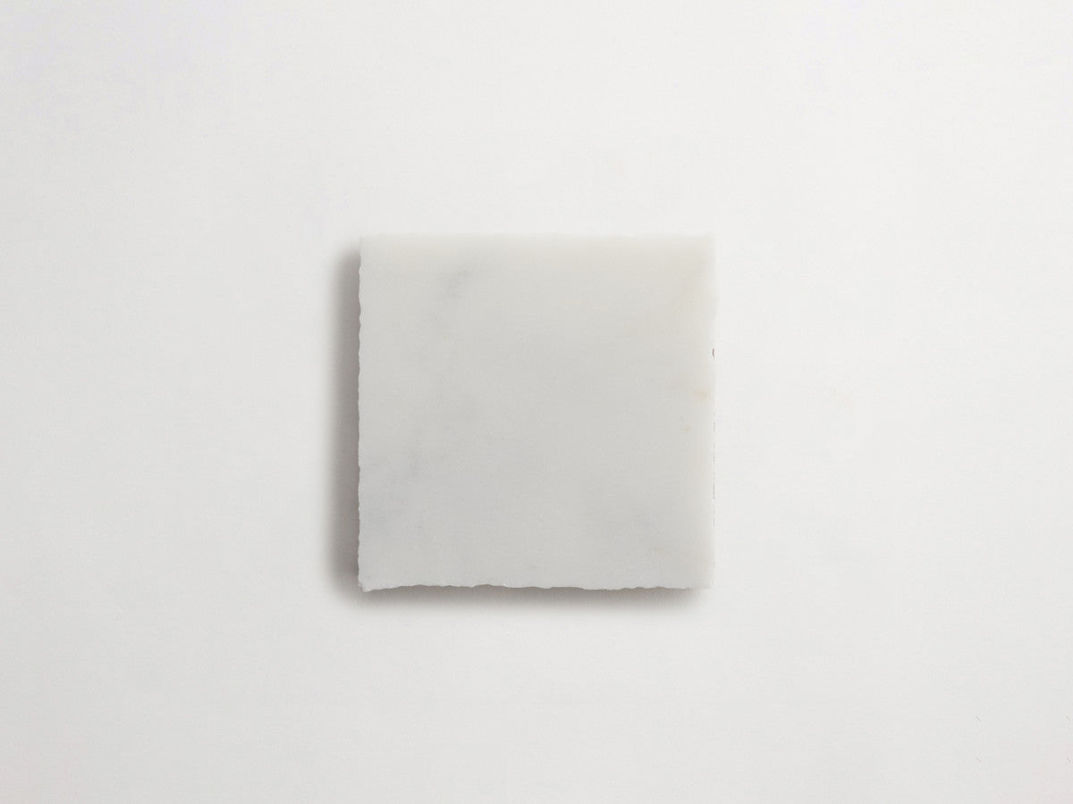 Lapidary stone tile 4 in. square Calacatta Gold Honed.
