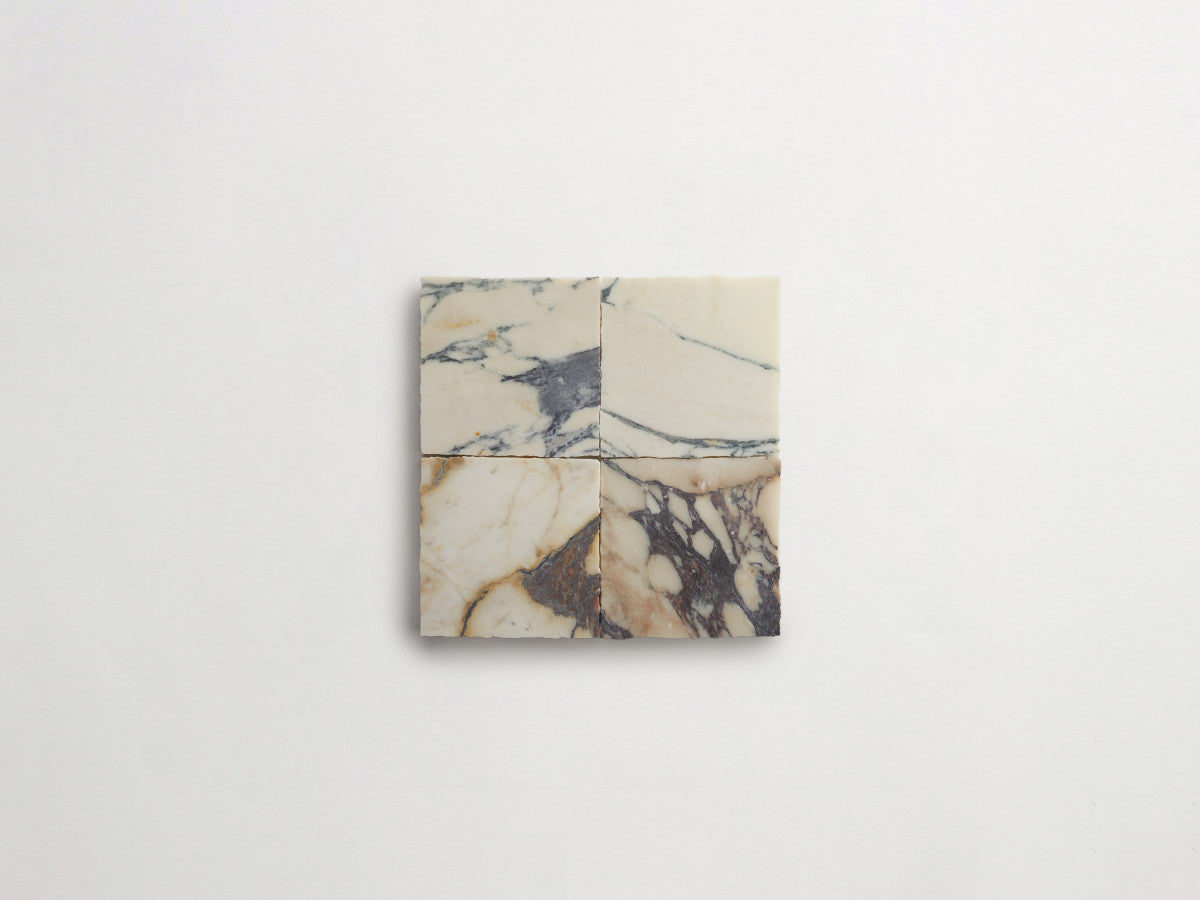 Lapidary stone tile 4 in. square Calacatta White Honed.