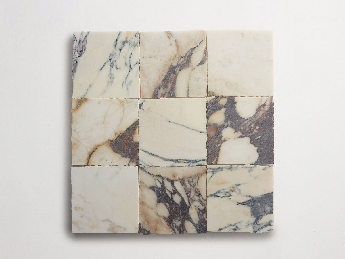 Lapidary stone tile 4 in. square Calacatta White Honed.