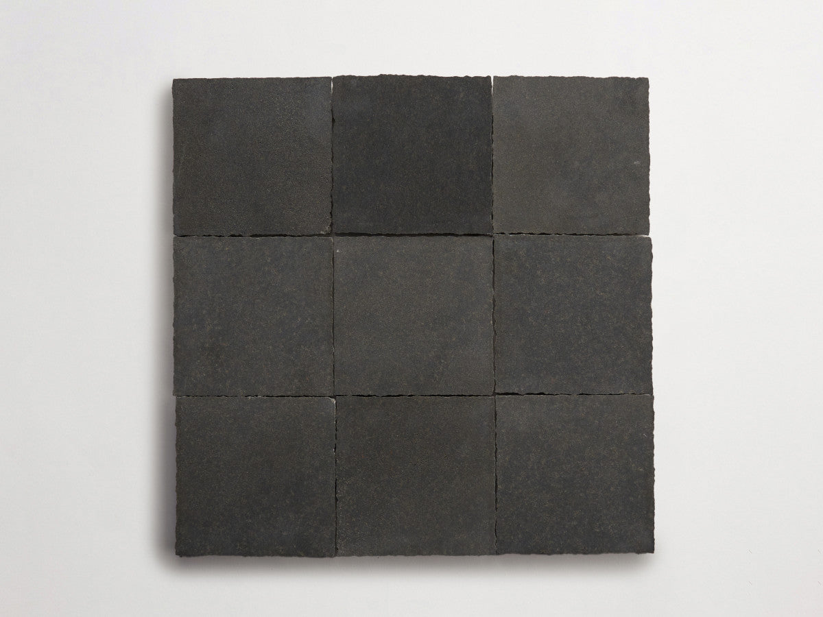 Lapidary stone tile 4 in. square Warm Black Honed.
