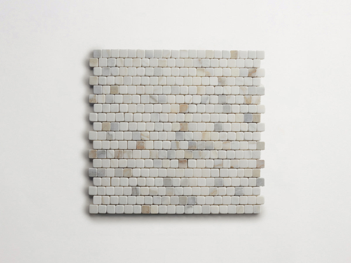 Lapidary stone micro-mosaics ⅝" Tumbled Calacatta Gold.